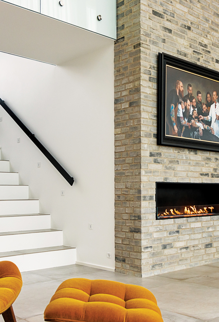 Bioethanolbrenner Montreal Front im Wohnzimmer mit Steinwand